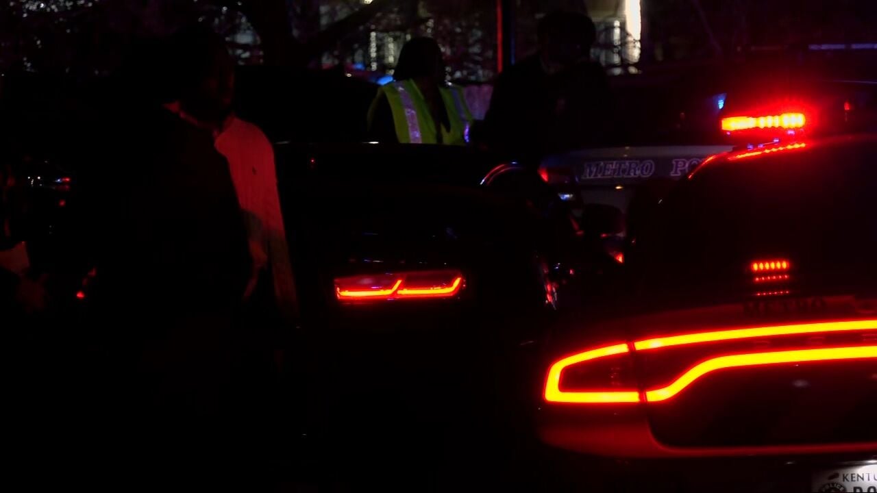 Louisville police say officers fatally shot woman in 'mental health crisis' who charged at them with sharp object